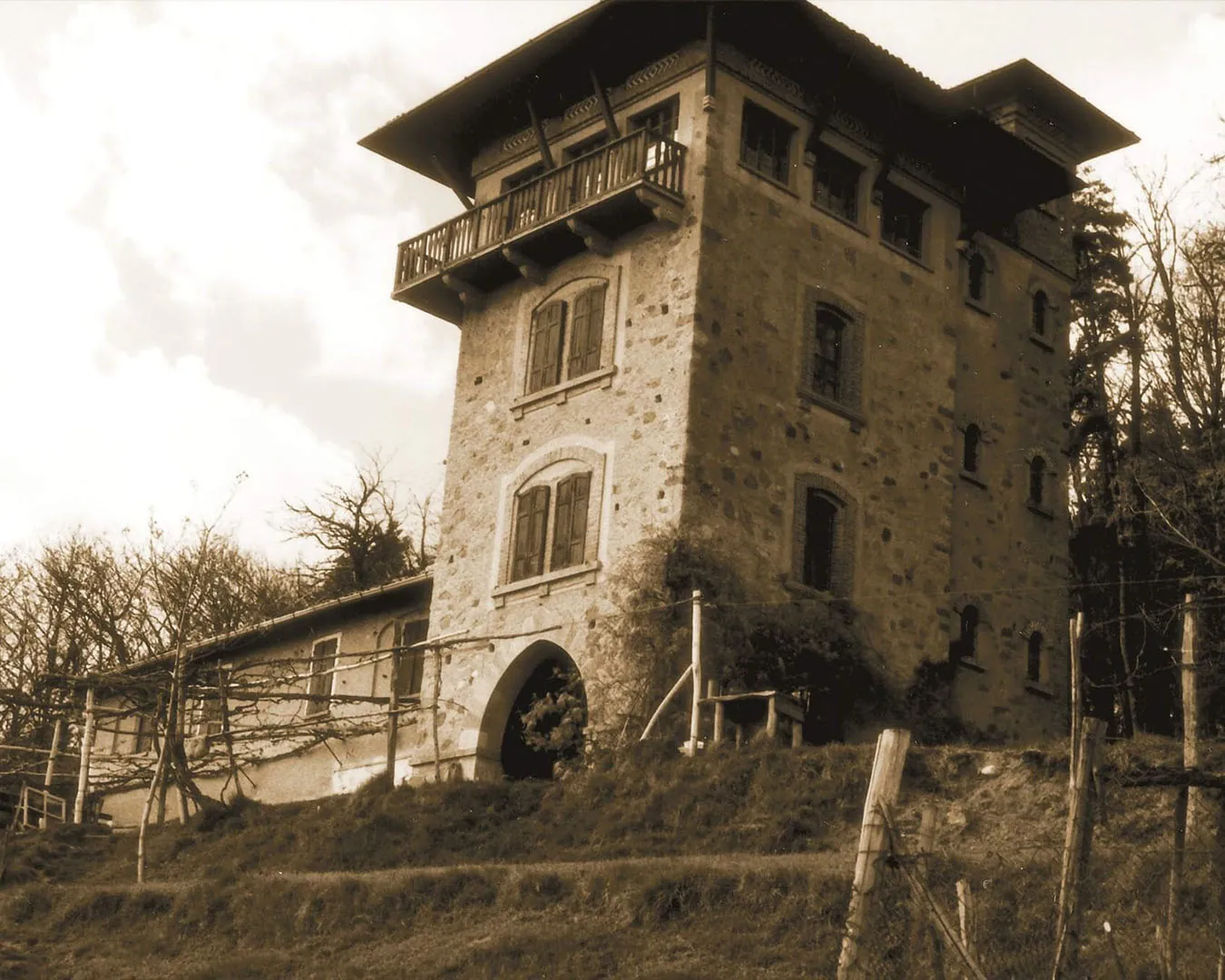 The tower of the Tenuta in an old sepia photograph